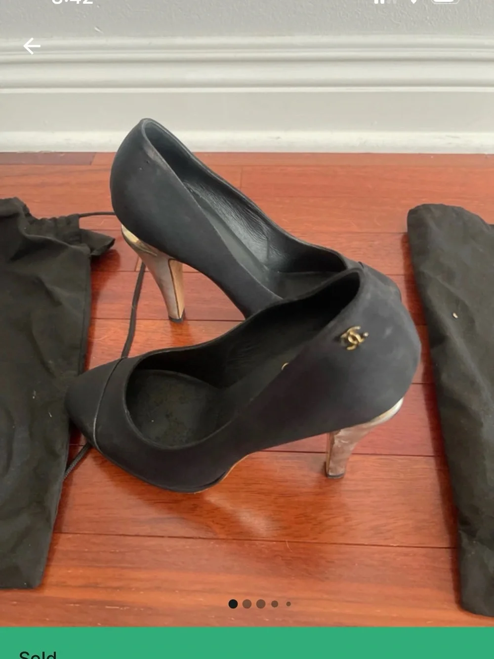 CHANEL Black Leather Cap-Toe Pumps